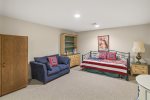 Lower level features 1 twin bed, 1 trundle bed, 2 sleeper sofas and a 4th bathroom
